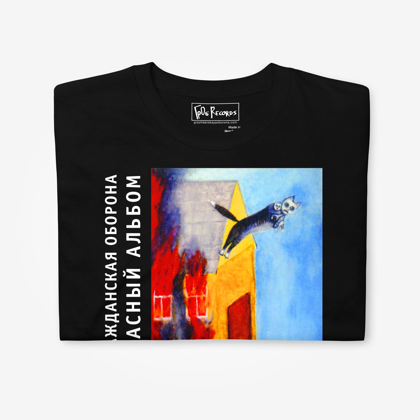 Folded Egor Letov Grazhdanskaya Oborona black T-shirt with large print of Red Album cover artwork - clouseup photo with inside lable design