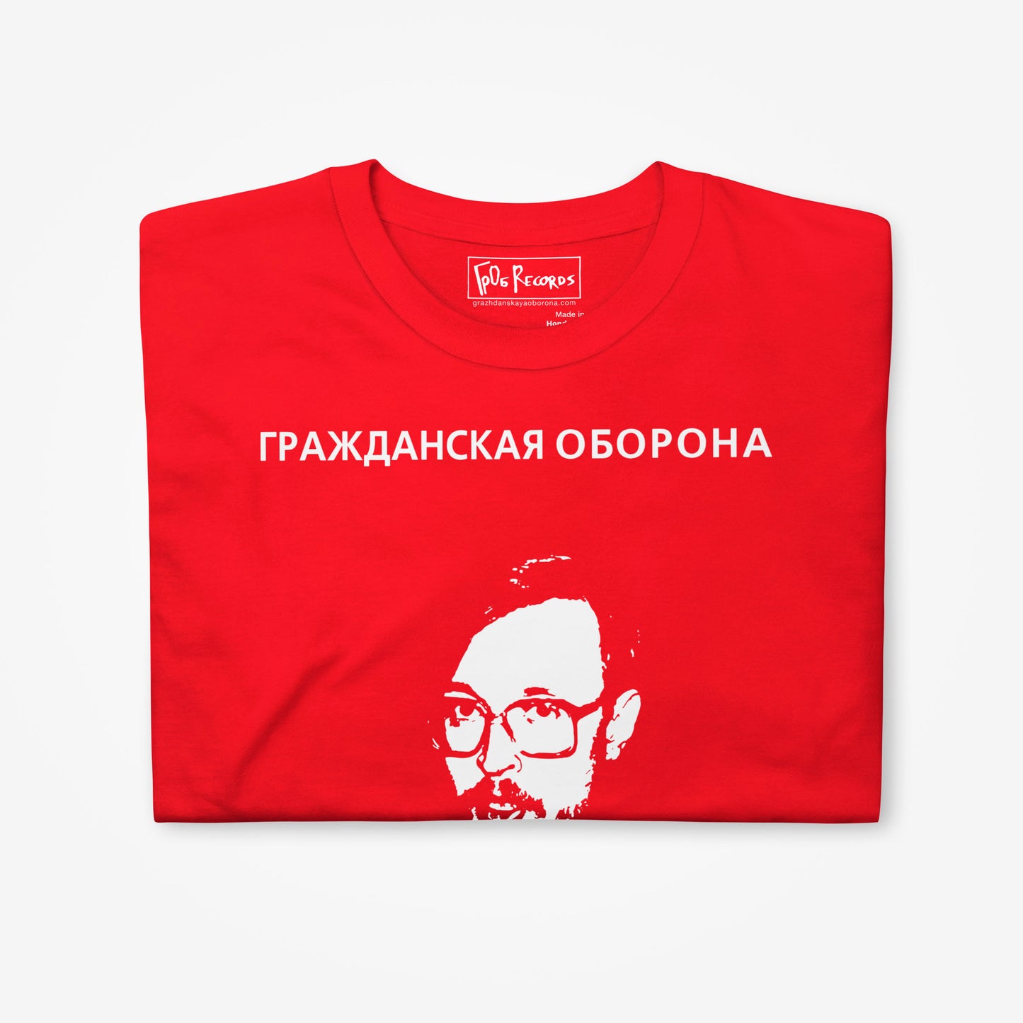 Grazhdanskaya Oborona, Red Album artwork with Egor Letov face, unisex red T-shirt - folded shirt closeup photo with inside label with GrOb Records logo 